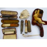 Late 19thC and early 20thC smoking related items: to include cheroot holders S