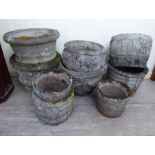 Nine various composition stone terrace planters largest 16''dia RSM