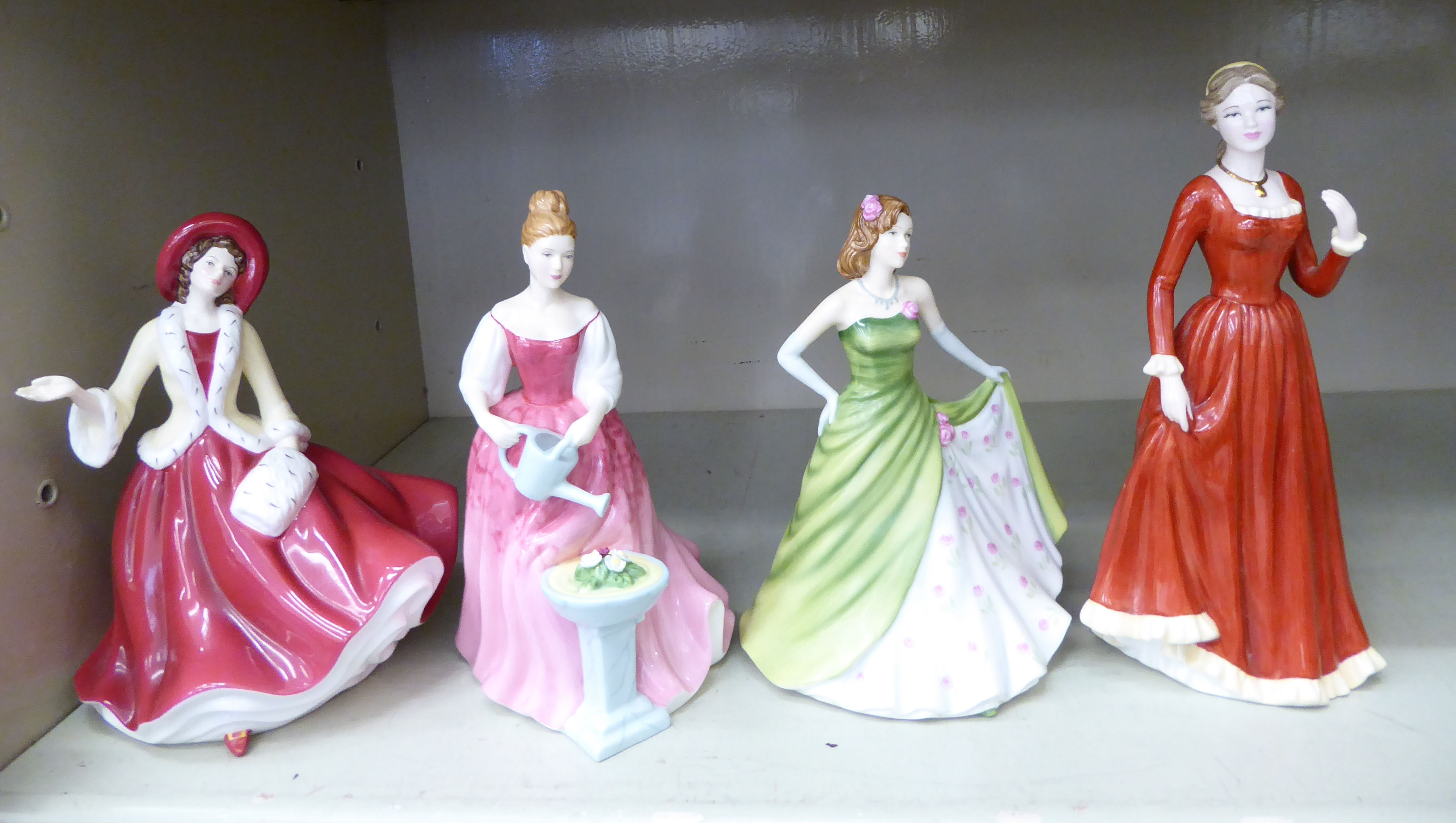 Four Royal Doulton china figures from the Pretty Ladies series, viz. 'Christmas Day 2009' 7.
