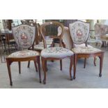 A pair of Biedermeier inspired, walnut framed shield back salon chairs with tapestry upholstery,