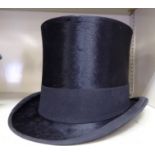 A Lock & Co black silk top hat size 6 3/4 22'' inner circumference OS10