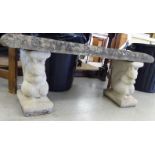 A composition stone, three part terrace bench,