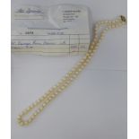 A cultured pearl necklace,