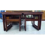 A nesting set of three 1970s teak and tiled top occasional tables,