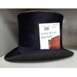 An early 20thC black silk top hat 22'' inner circumference CA