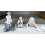 Three Royal Copenhagen porcelain figures, viz. a mermaid with a fish no.2348 2.