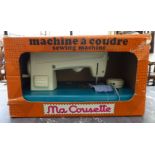 A mid 20thC Ma Cousette sewing machine boxed CA