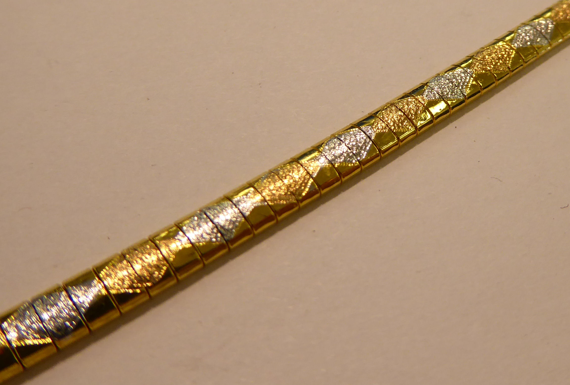 A 9ct gold tri-coloured gold flexible link bracelet, - Image 2 of 2