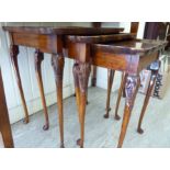 A nesting set of three 1950s walnut tray top tables,