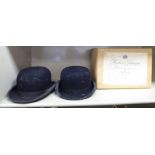 A Lock & Co black bowler hat 20'' inner circumference; another by GA Dunn & Co 19.