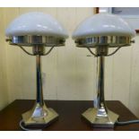 A pair of Art Deco Lustrerie Deknudt stainless steel table lamps of tapered hexagonal form with