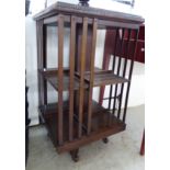 A 1920/30s mahogany two tier revolving bookcase,