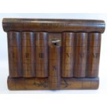 A late 19thC Grand Tour souvenir, an olivewood novelty lockable casket with 'secret' latches,