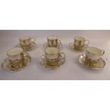 A set of six late Victorian silver coffee cups with wrythen moulded,