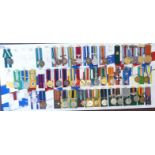 Approximately forty-three police and other enforcement associated medals, many on ribbons,