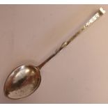 An Arts & Crafts inspired spot-hammered silver salt spoon, the straight,
