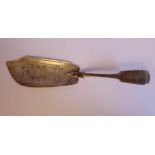 An early Victorian silver fiddle pattern fish slice,