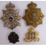 Four military helmet badges, viz.