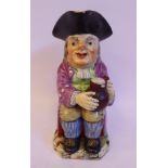 A late 18th/early 19thC Staffordshire pottery Toby jug,