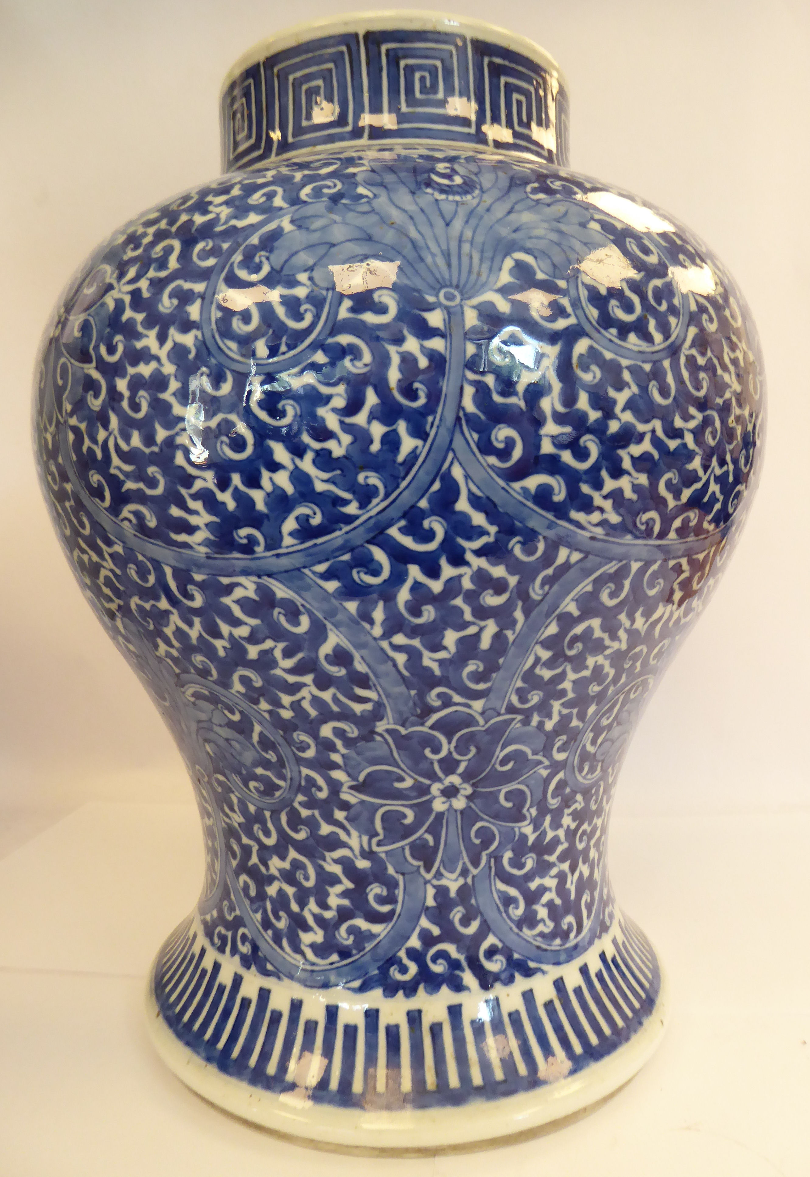 A late 19th/early 20thC Chinese porcelain vase of waisted baluster form, having an upstand rim,