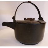 A late 19thC Chinese patinated bronze saucepan with straight sides, a wide channel spout,