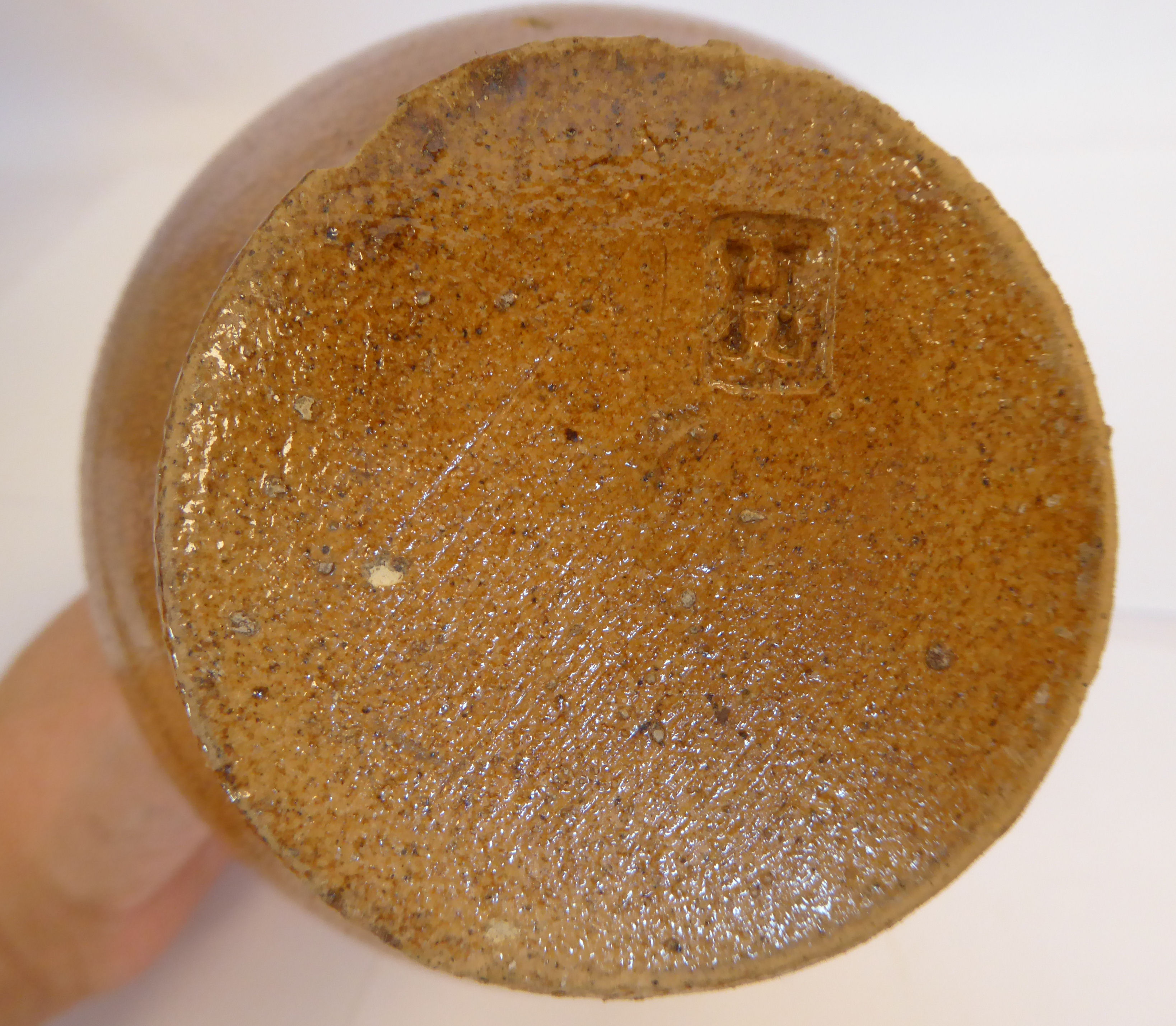 An 'antique' Continental salt glazed bellarmine of ovoid form with a strap handle bears an - Image 6 of 6