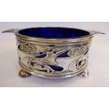 An Art Nouveau silver framed dish, having a blue glass liner,