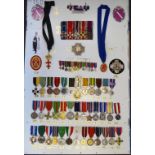 Approximately fifty-five commemorative, service and civic medals from around the world,