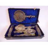 A silver backed/mounted six piece dressing table set,