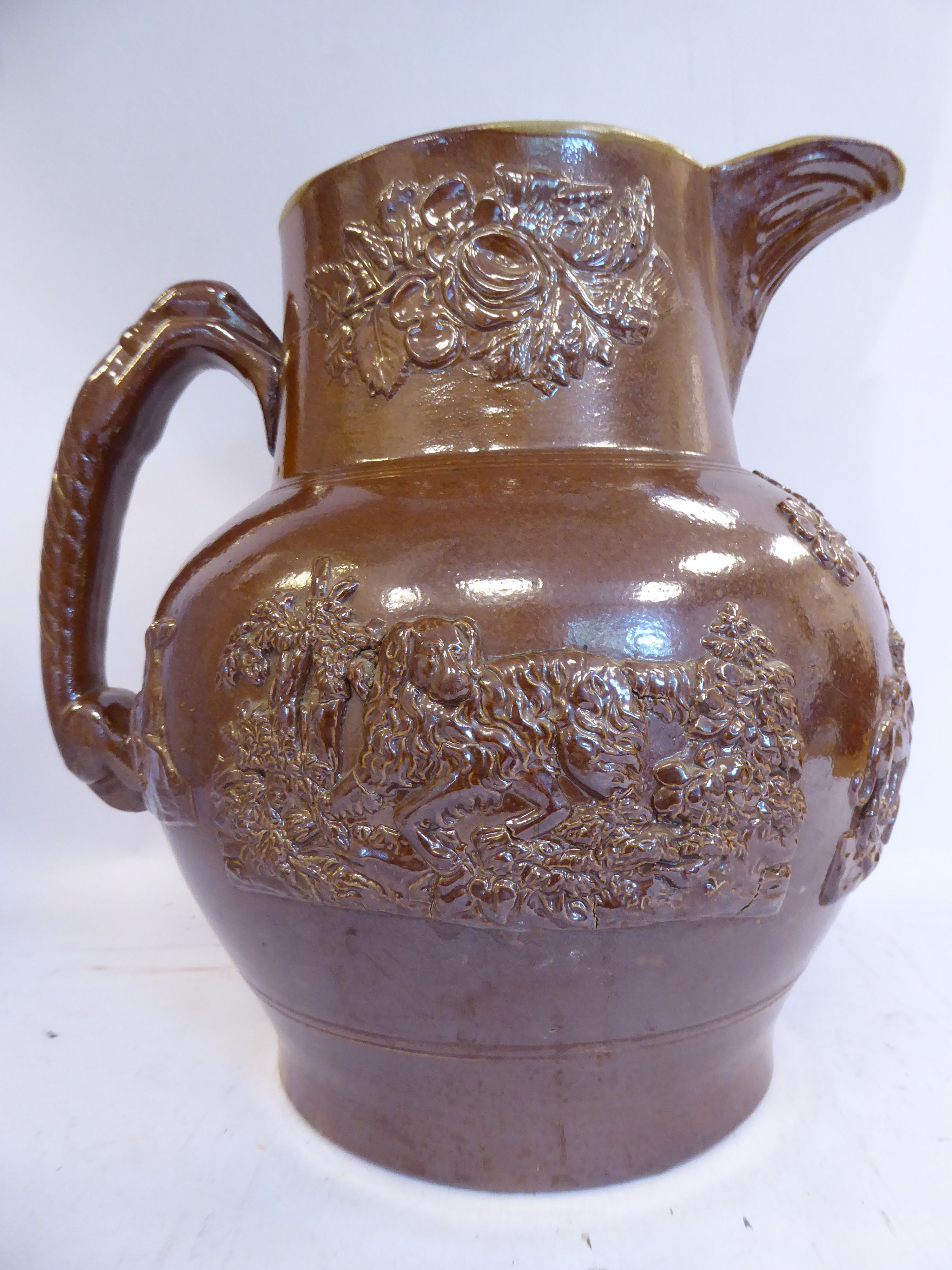 A mid 19thC salt glazed stoneware harvest jug, having an upstand neck and hound handle, - Image 3 of 6