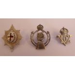 Three silver military cap badges, viz.