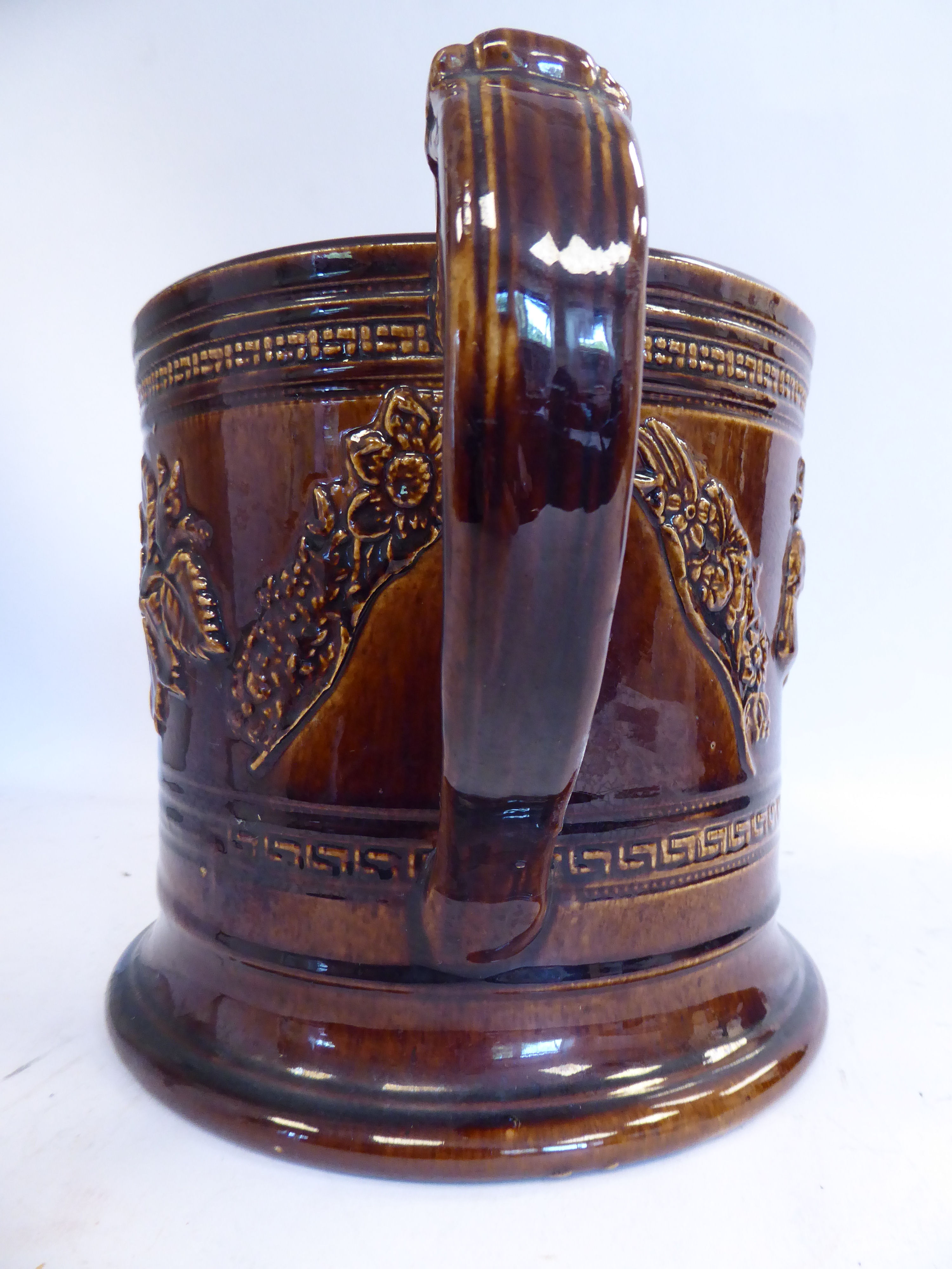 A mid 19thC treacle glazed earthenware 'oversize' loving cup with straight sides, - Image 6 of 7