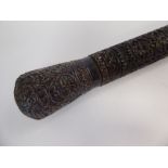 A late 19thC Kashmiri hardwood walking cane of tapered form,