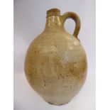 A late 18th/19thC salt glazed stoneware, ovoid shaped flagon with a strap handle 12.
