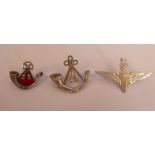 Three silver military cap badges, viz.