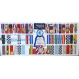 Approximately twenty-four police and other enforcement associated medals, many on ribbons,