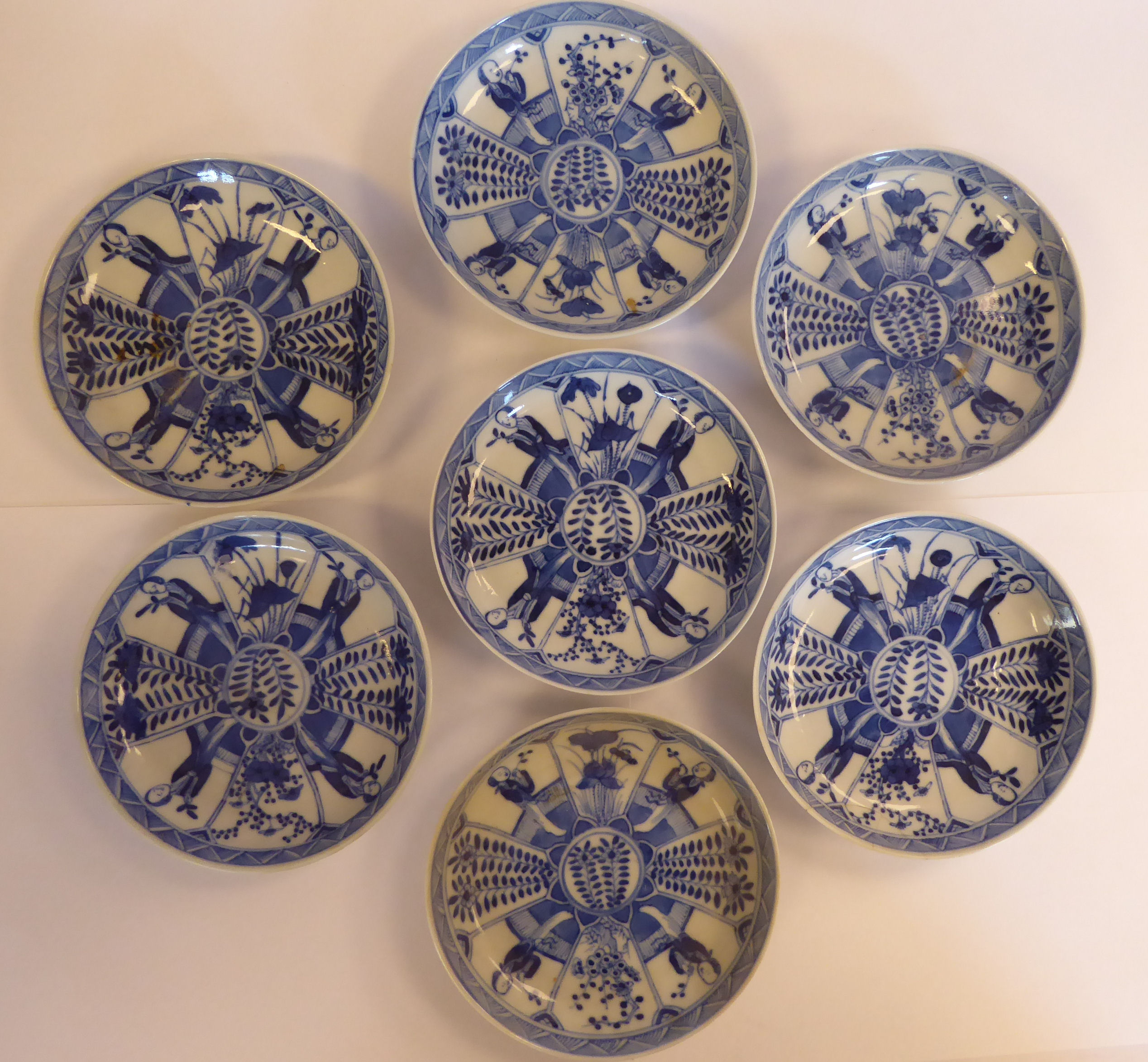 A set of seven late 19thC Chinese porcelain footed saucer dishes,