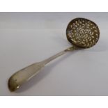 A George III silver fiddle pattern sifter spoon, the shallow,