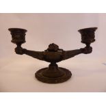 A late 19thC cast and patinated bronze table candlestand, featuring a lamp style base,