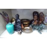 Tribal and ethnic artefacts: to include carved hardwood busts; and a turquoise ceramic vase 4.