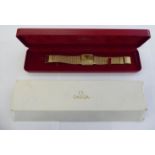 An Omega De Ville gold plated slim cased bracelet wristwatch,