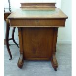 A late Victorian walnut and satinwood string inlaid marquetry Davenport with a stationery box