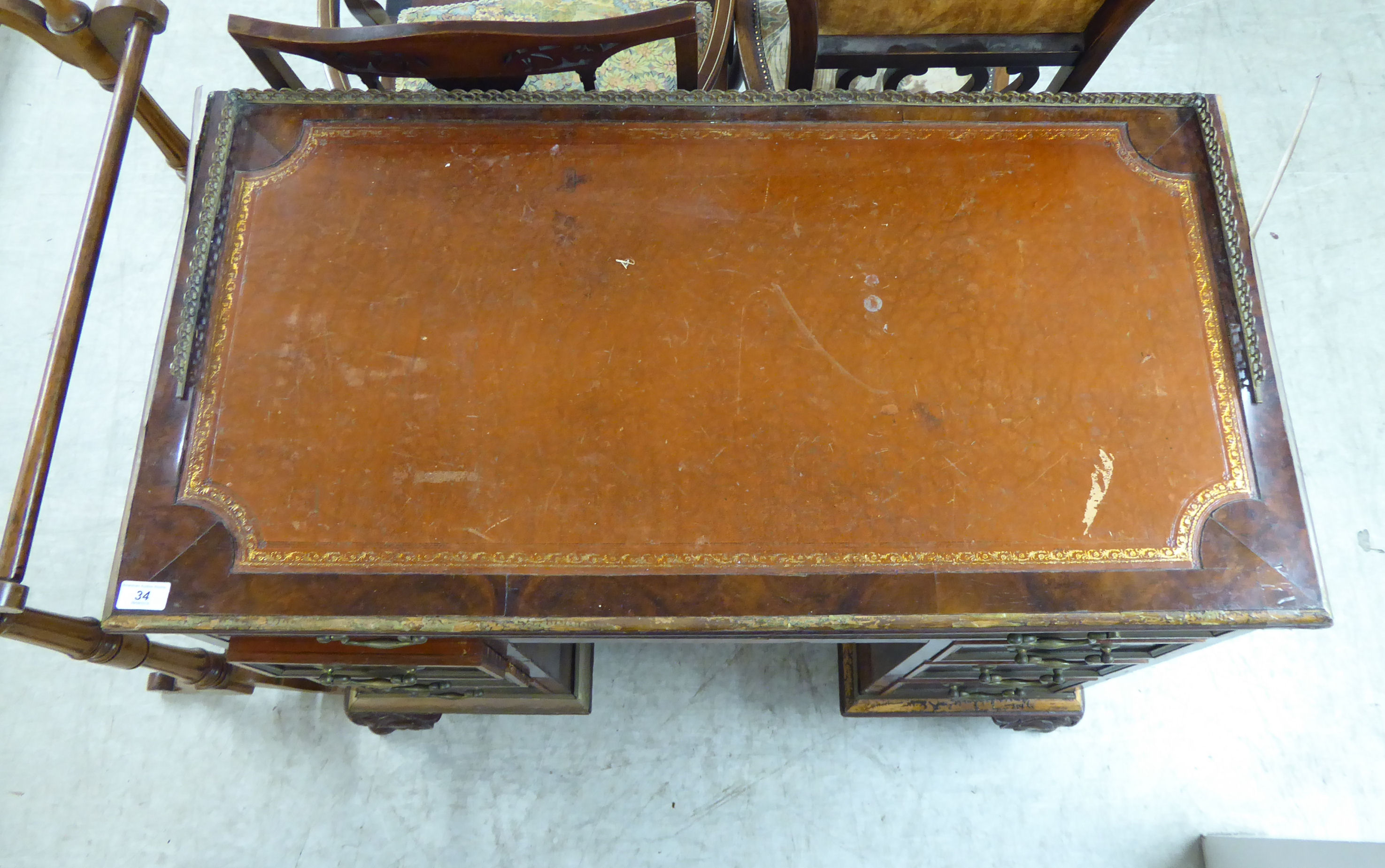 A 1930s burr walnut veneered twin pedestal desk, having a brass galleried border, - Image 2 of 2