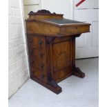 A mid Victorian walnut Davenport,