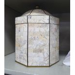 A modern mosaic clad octagonal drum design box with a domed,