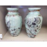 A pair of early 20thC Japanese, celadon glazed, baluster shaped vases,