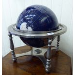 A modern simulated hardstone terrestrial globe,