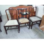 Two similar Georgian mahogany dining chairs with upholstered, drop-in seats,