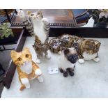 Four Winstanley pottery model cats: to include a seated tabby 14''h RAM