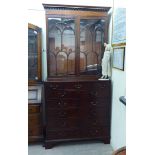 An early 19thC mahogany secretaire bookcase,